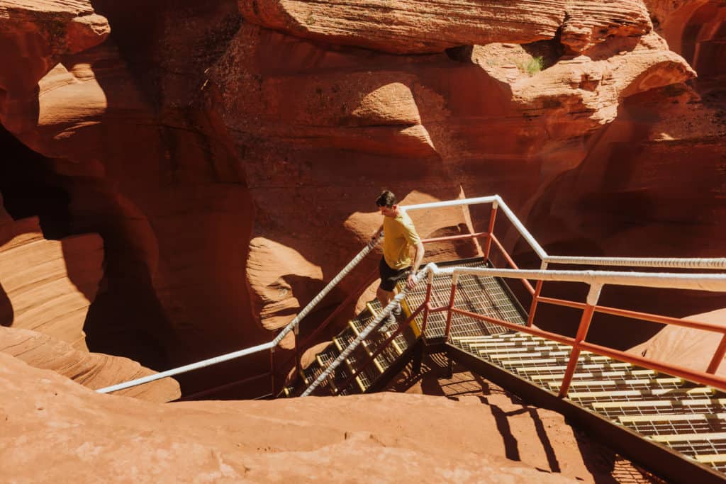 Jared Dillingham on an entry ladder at Antelope Canyon