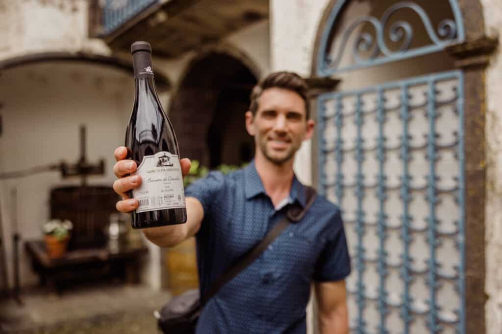 Jared Dillingham with a bottle of Azores wine