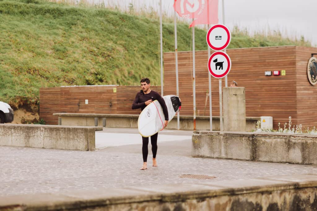 Surfers at Santa Barbara beach in the Azores