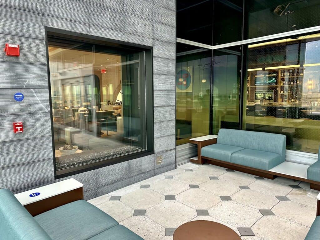 Fireplace on the patio at the JFK Delta Lounge
