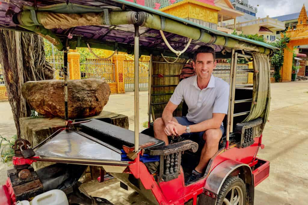 Jared Dillingham in a tuktuk in Cambodia