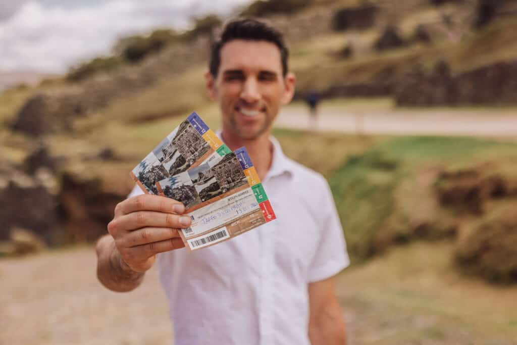 Jared Dillingham paying for a tourist pass to Cusco ruins