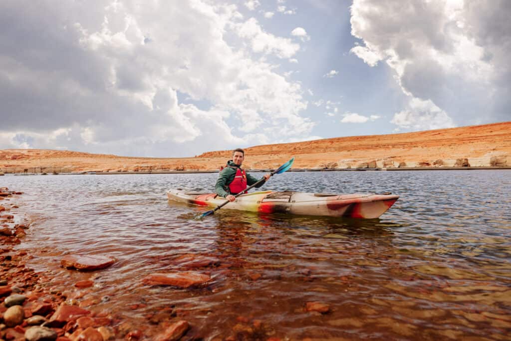 Jared Dillingham kayaking on Lake Powell in Page, AZ
