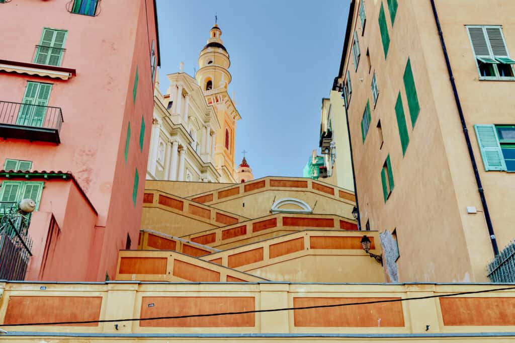 The stairs up to the old town in Menton, an easy trip from Nice on the Riviera