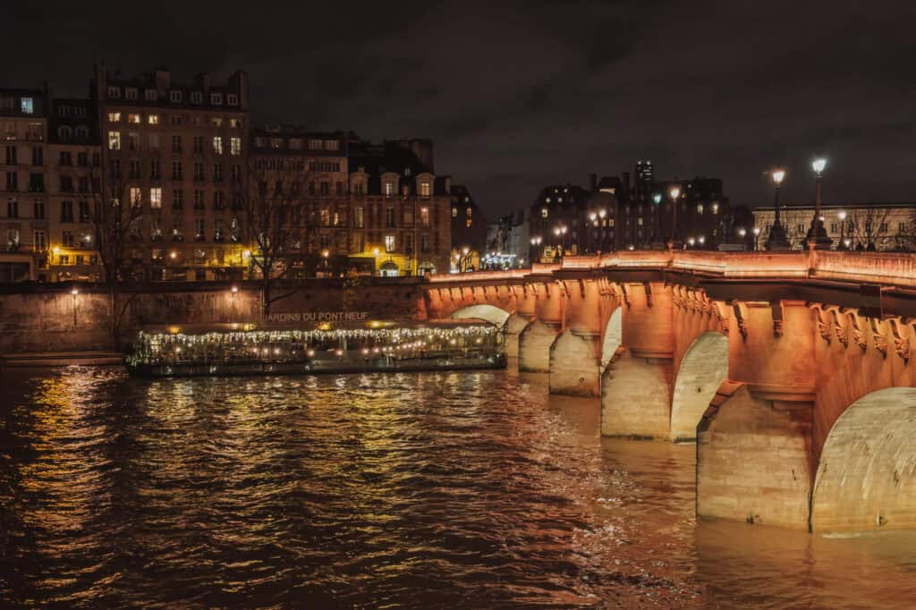 A cool winter night in Paris along the Seine River