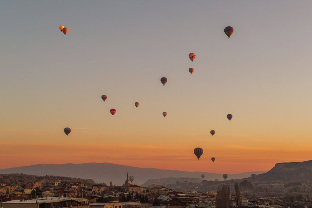 Nearly 100 balloons launch each morning at sunrise