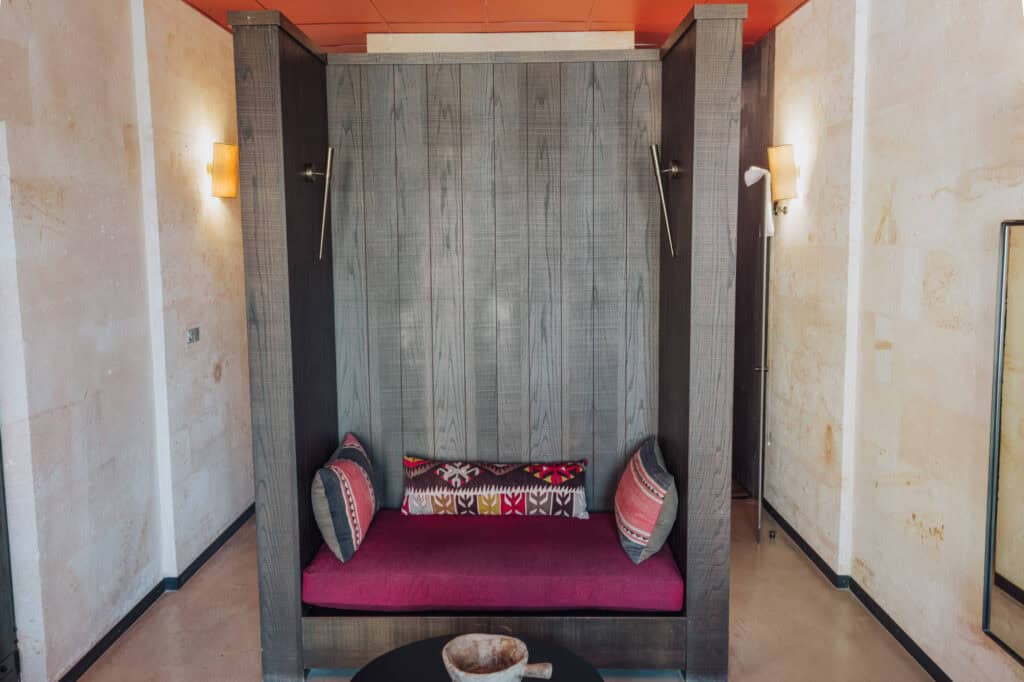 A seating area inside one of the cave rooms