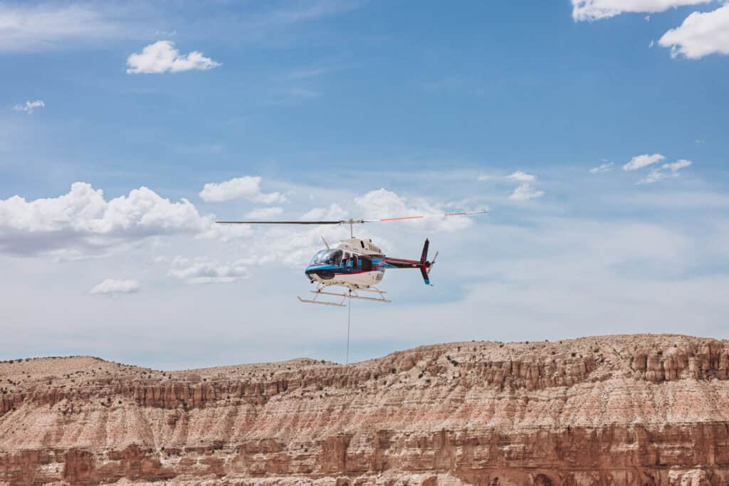 A helicopter flying to Havasupai Falls