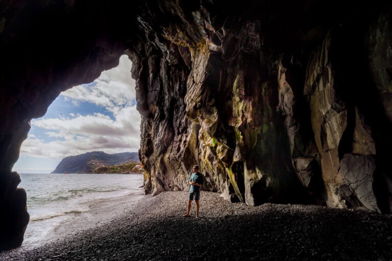 Exploring a cave on a road trip around Madeira