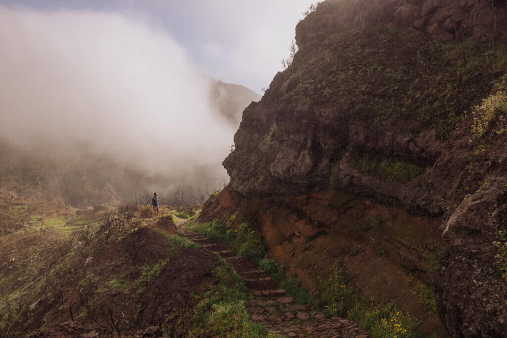 Jared Dillingham hiking a foggy PR12 trail up Pico Grande