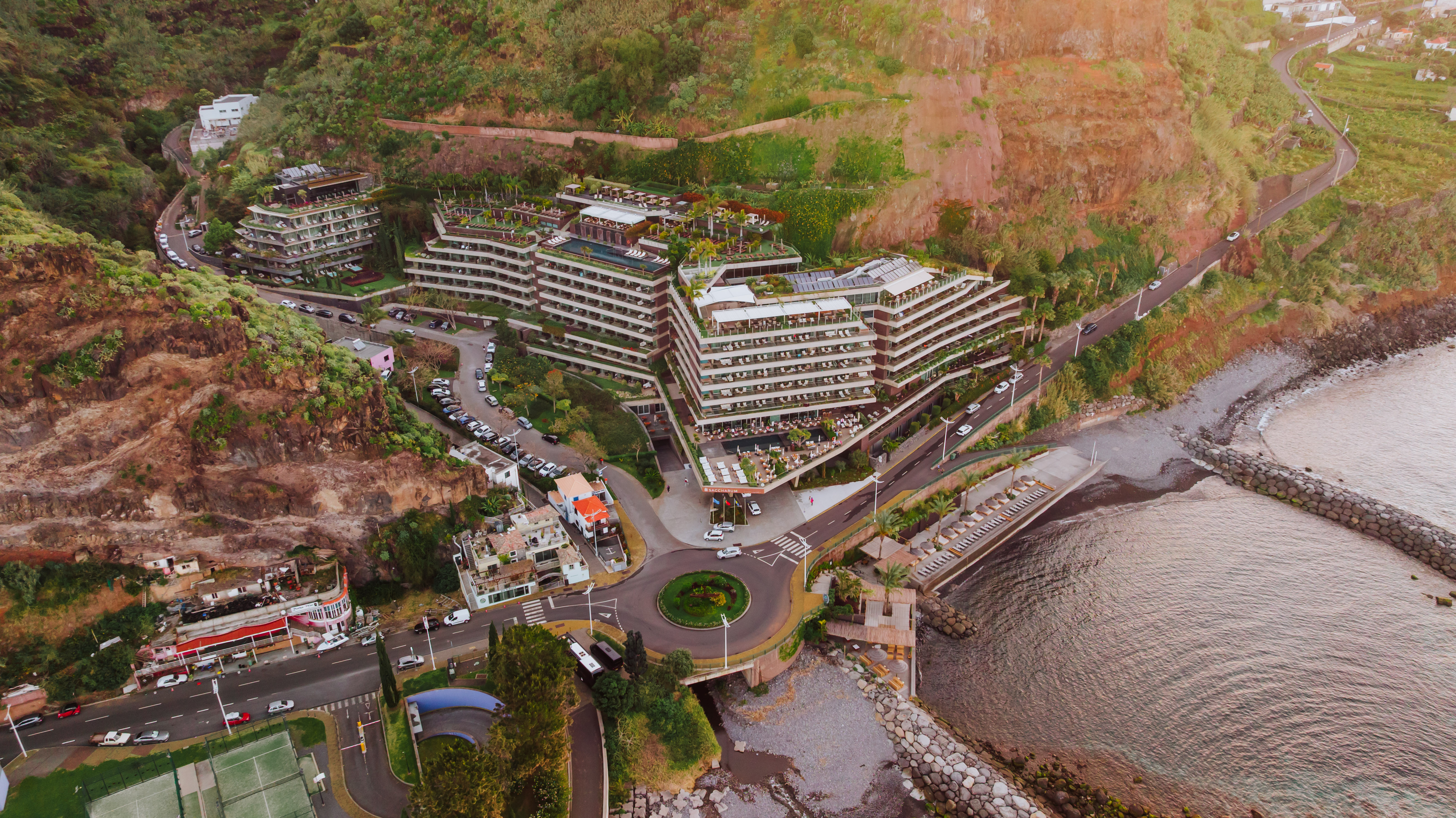 An aerial drone photo of the Saccharum, a Savoy luxury hotel on Madeira's southern coast.
