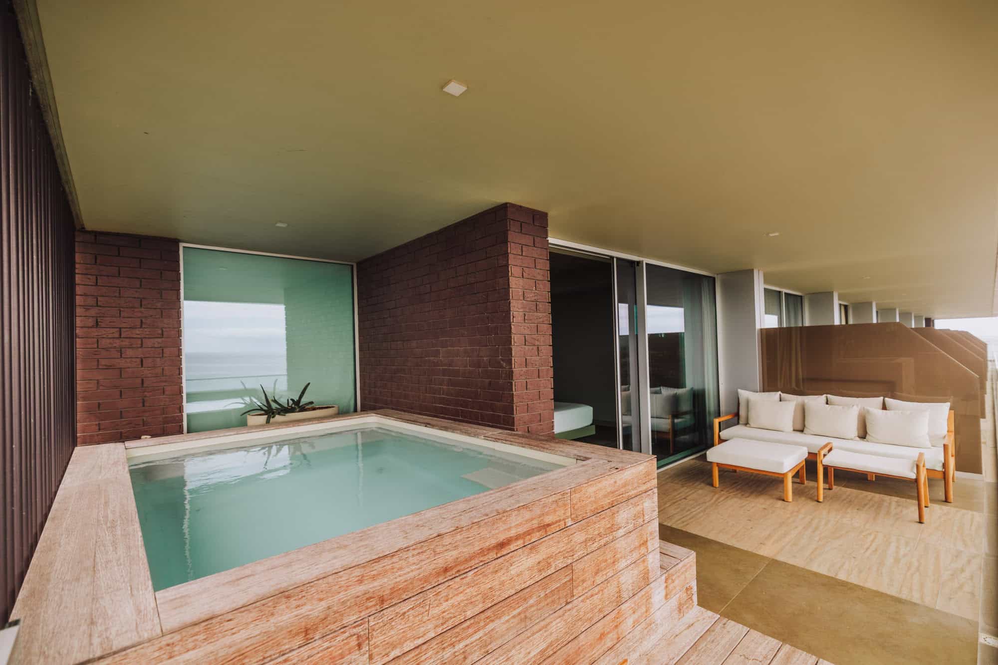 A balcony with plunge pool at the Saccharum Resort & Spa