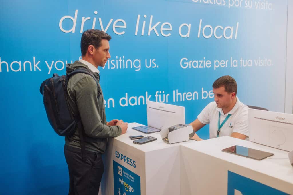 Jared Dillingham renting a car at the airport in Funchal Madeira