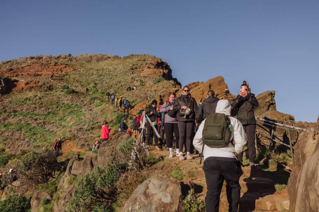 Hikers crowding the trail