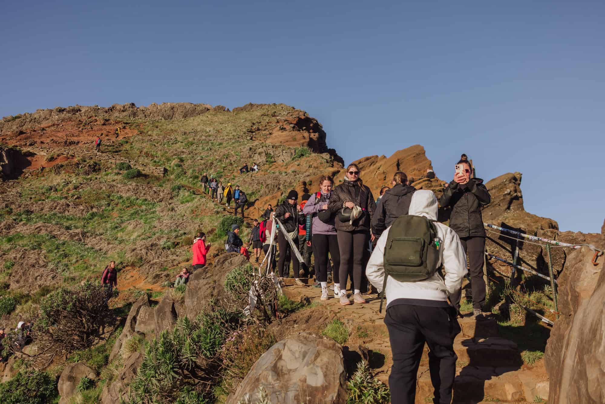 Hikers crowding the trail