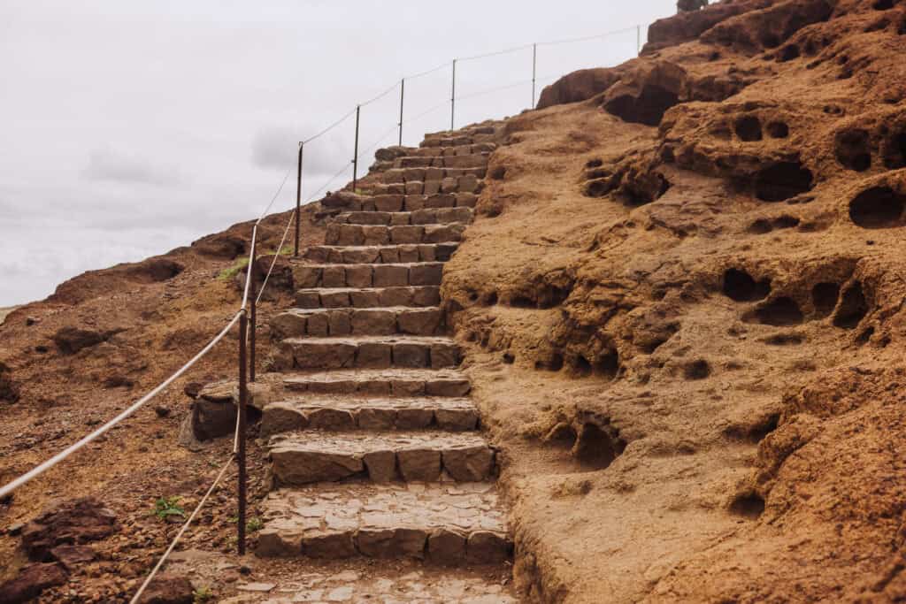 Steps with ropes up a trail at Ponta de Sao Lourenco