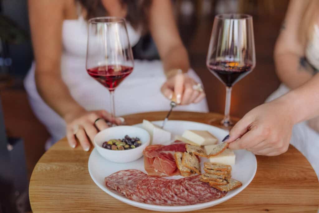 Glasses of wine and a charcuterie board at a tasting room in Vancouver, WA