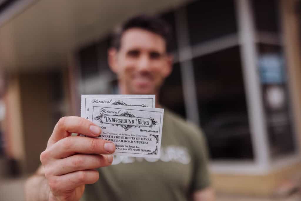 Jared Dillingham showing the Havre Underground tickets