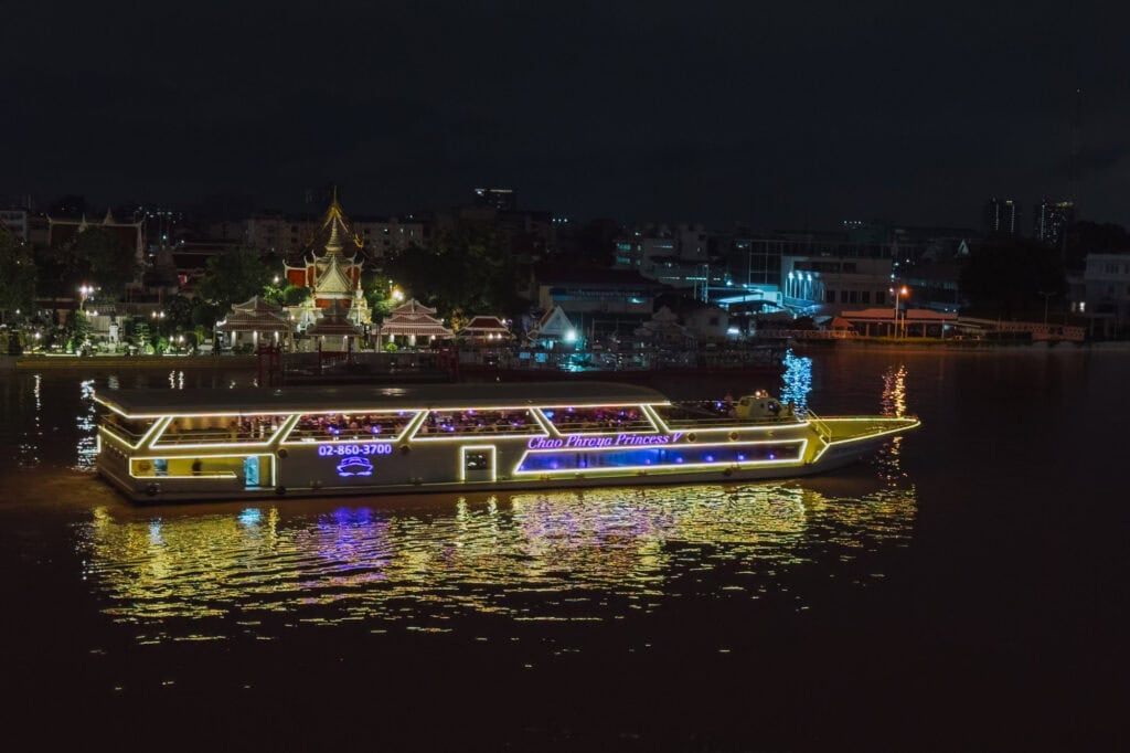 A river and temple view from a rooftop bar in Bangkok