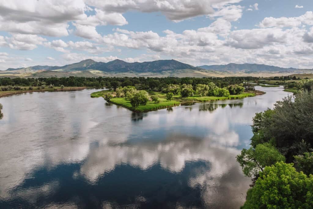 The clouds reflecting in the Missouri River in Cascade, MT