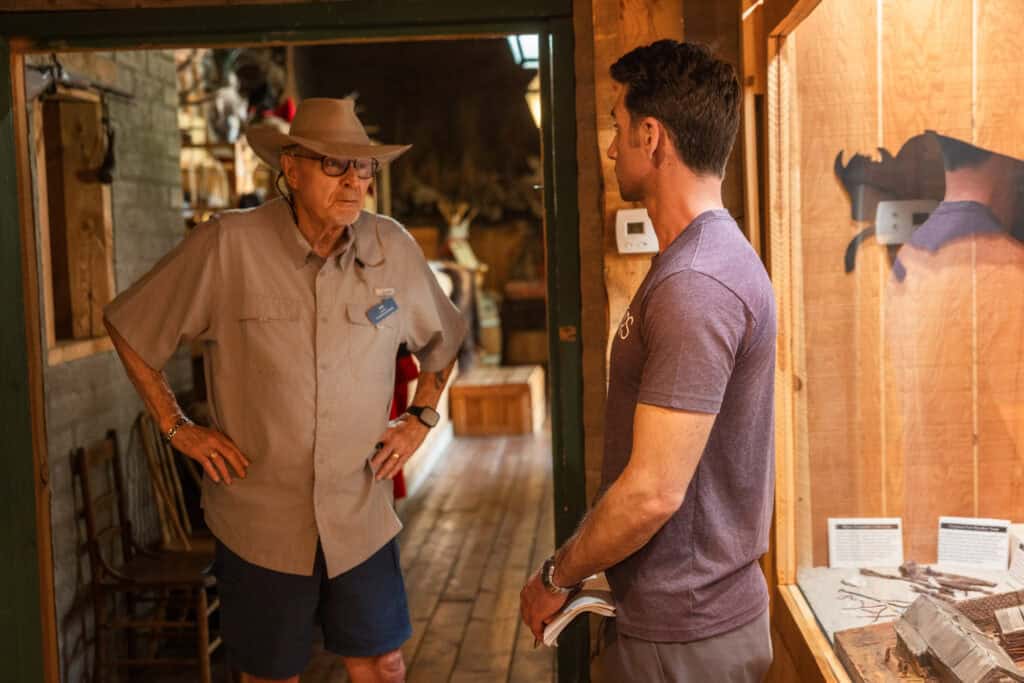 Talking to a tour guide at the museum