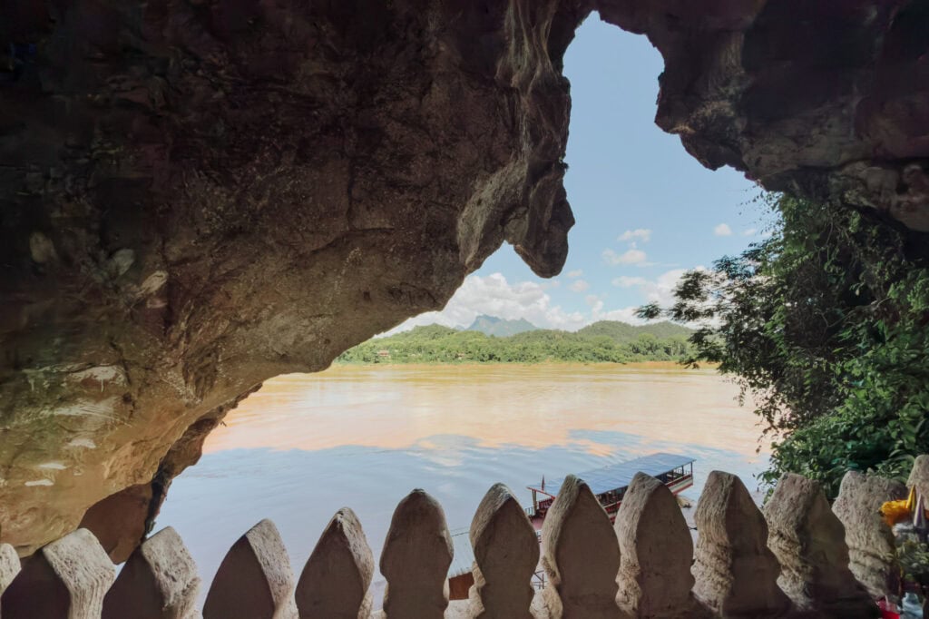 Looking out from the Thousand Buddha Cave to the Mekong River