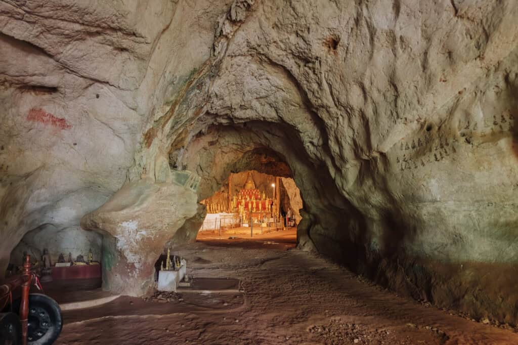 Walking into the upper cave at the Thousand Buddha Cave