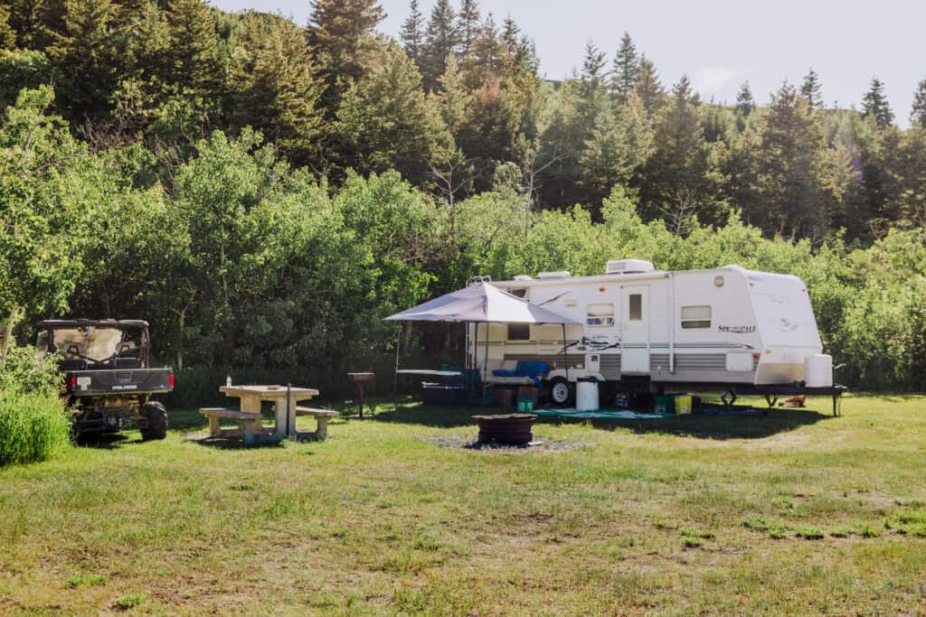 An RV camper at Swift Dam near Dupuyer, Montana