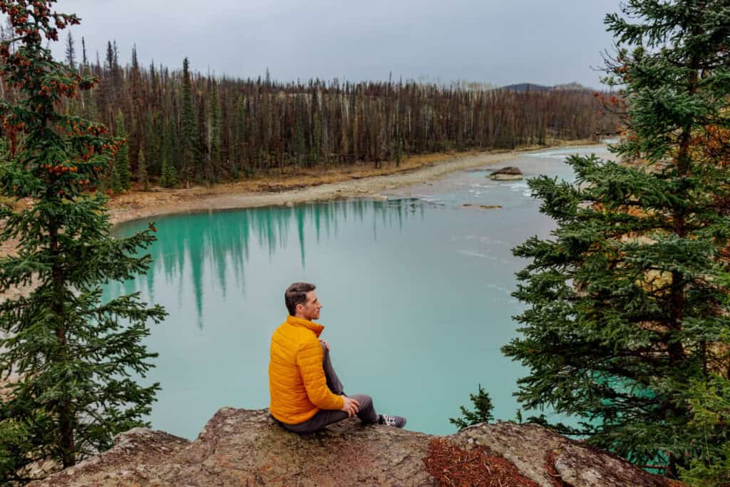 Jared Dillingham at one of the turquoise glacial lakes on the Athabasca River in Alberta