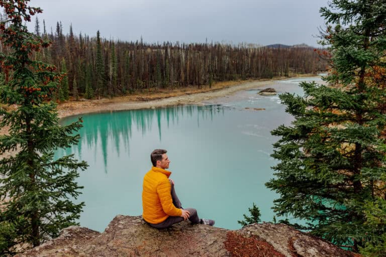 Jared Dillingham at one of the turquoise glacial lakes on the Athabasca River in Alberta