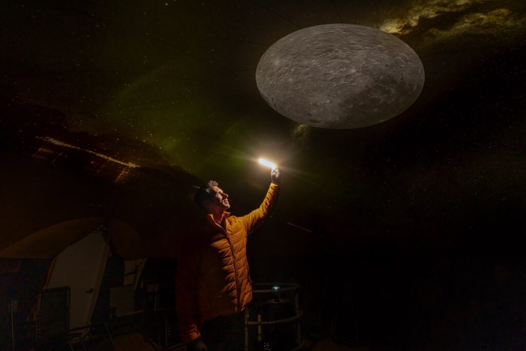 Jared Dillingham in the planetarium at the Fairmont Jasper Park Lodge