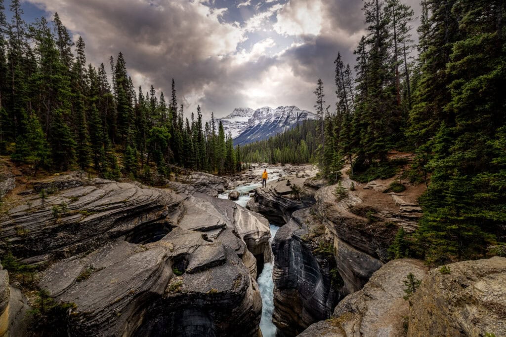 Jared Dillingham hiking at Mistaya Canyon