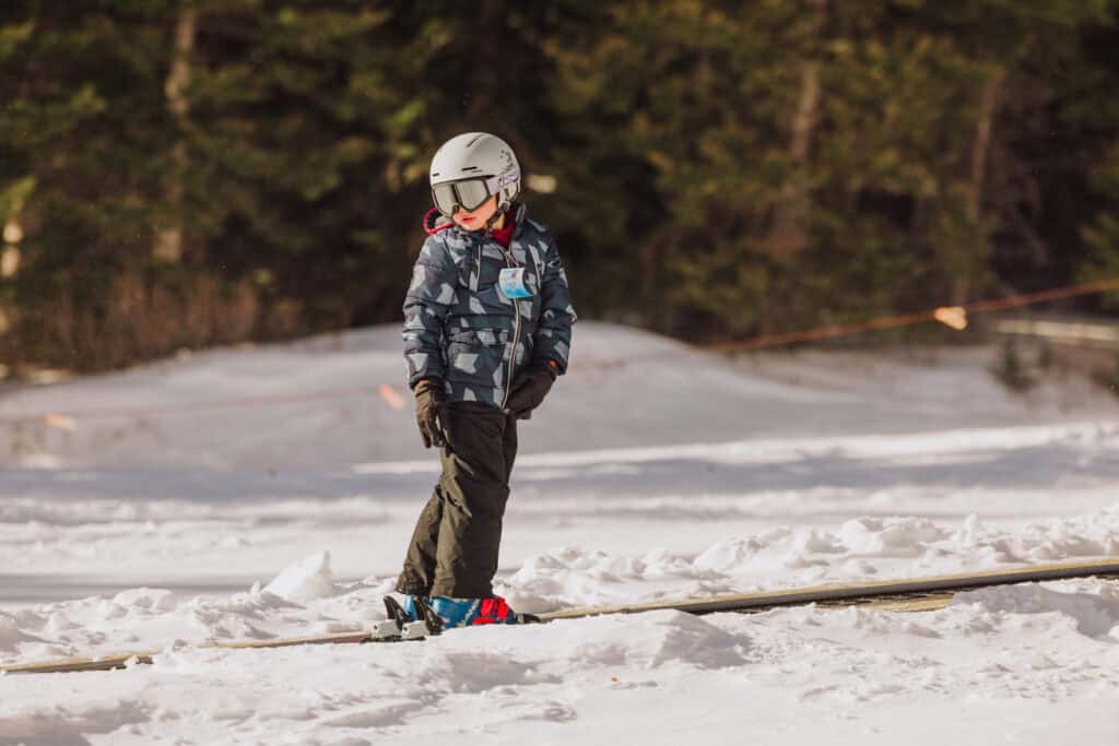 A kid going down the slope at Teton Pass