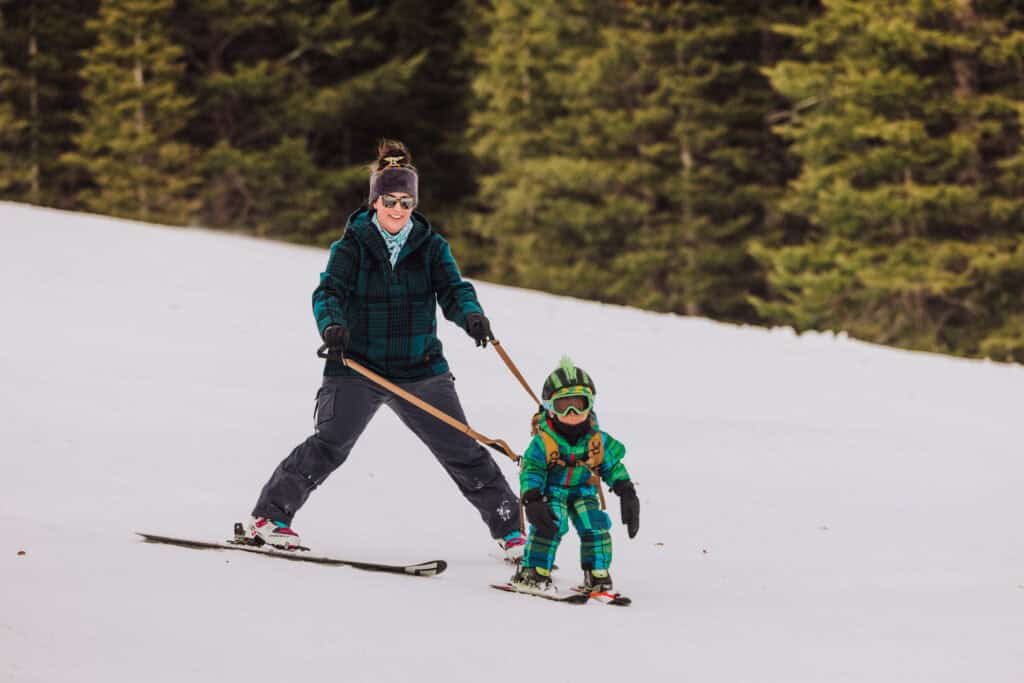 A mom and son going down Teton Pass