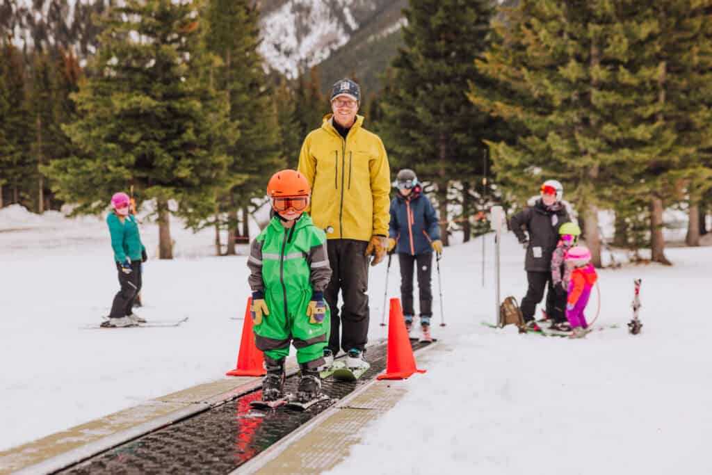Going up the magic carpet to ski the bunny slope at Teton Pass Montana