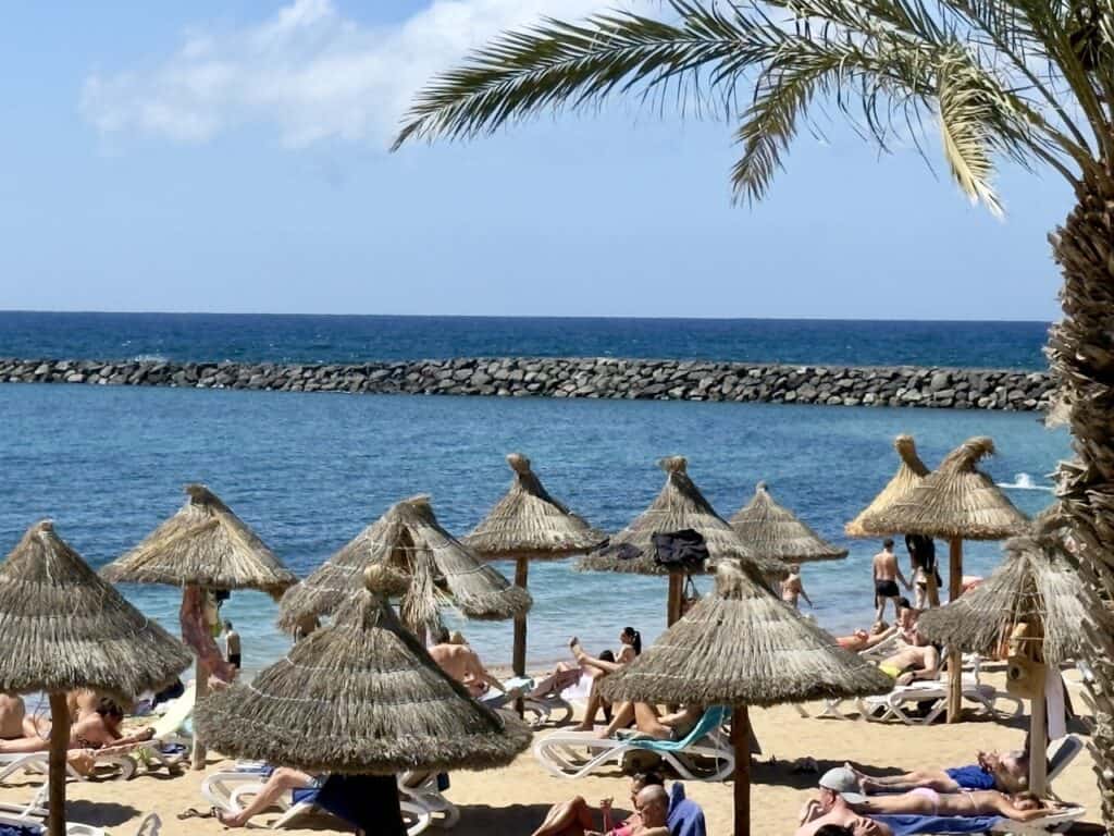 The beach at Los Christianos on Tenerife, where you can catch a ferry to other Canary Islands