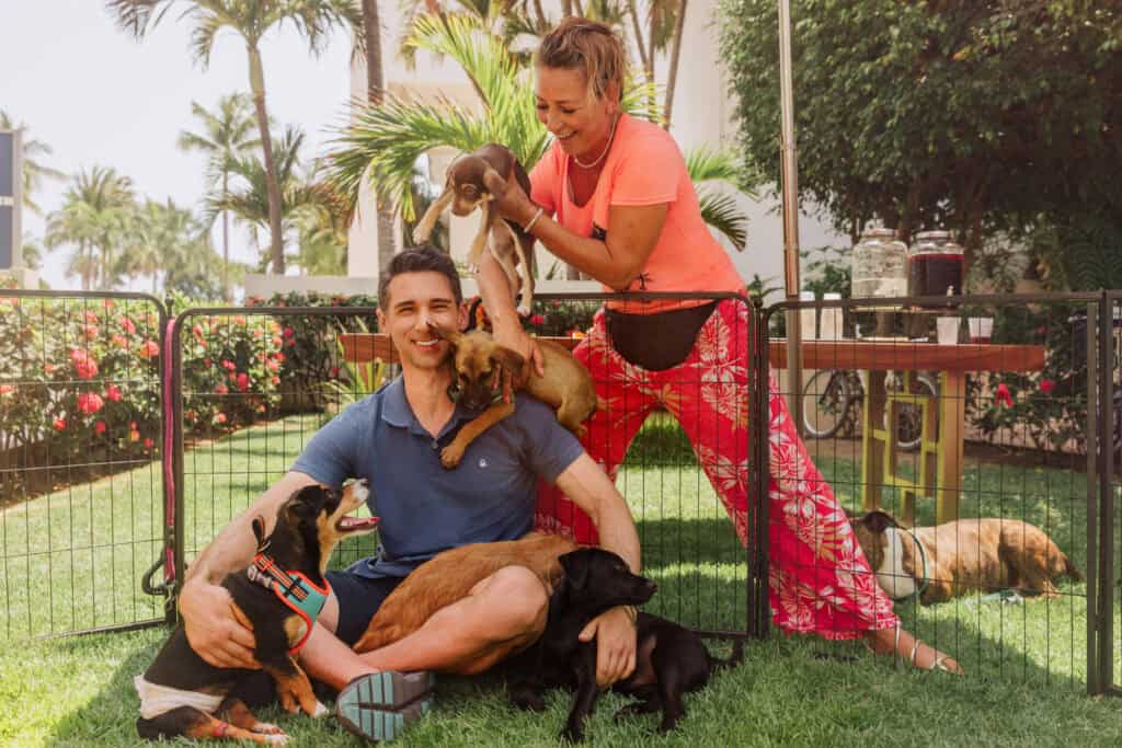 Jessica Garibay, the founder of A Dog's New Life, with some of the rescue dogs at Marival Emotions