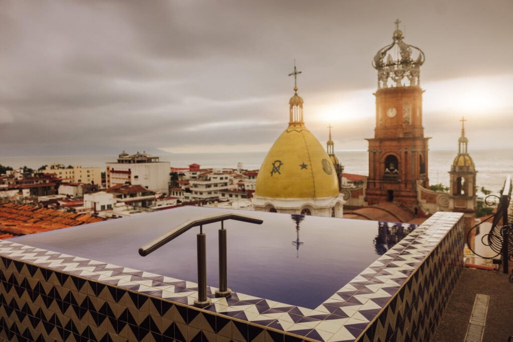 A view from the pool of the Bellview Hotel Boutique of the historic church