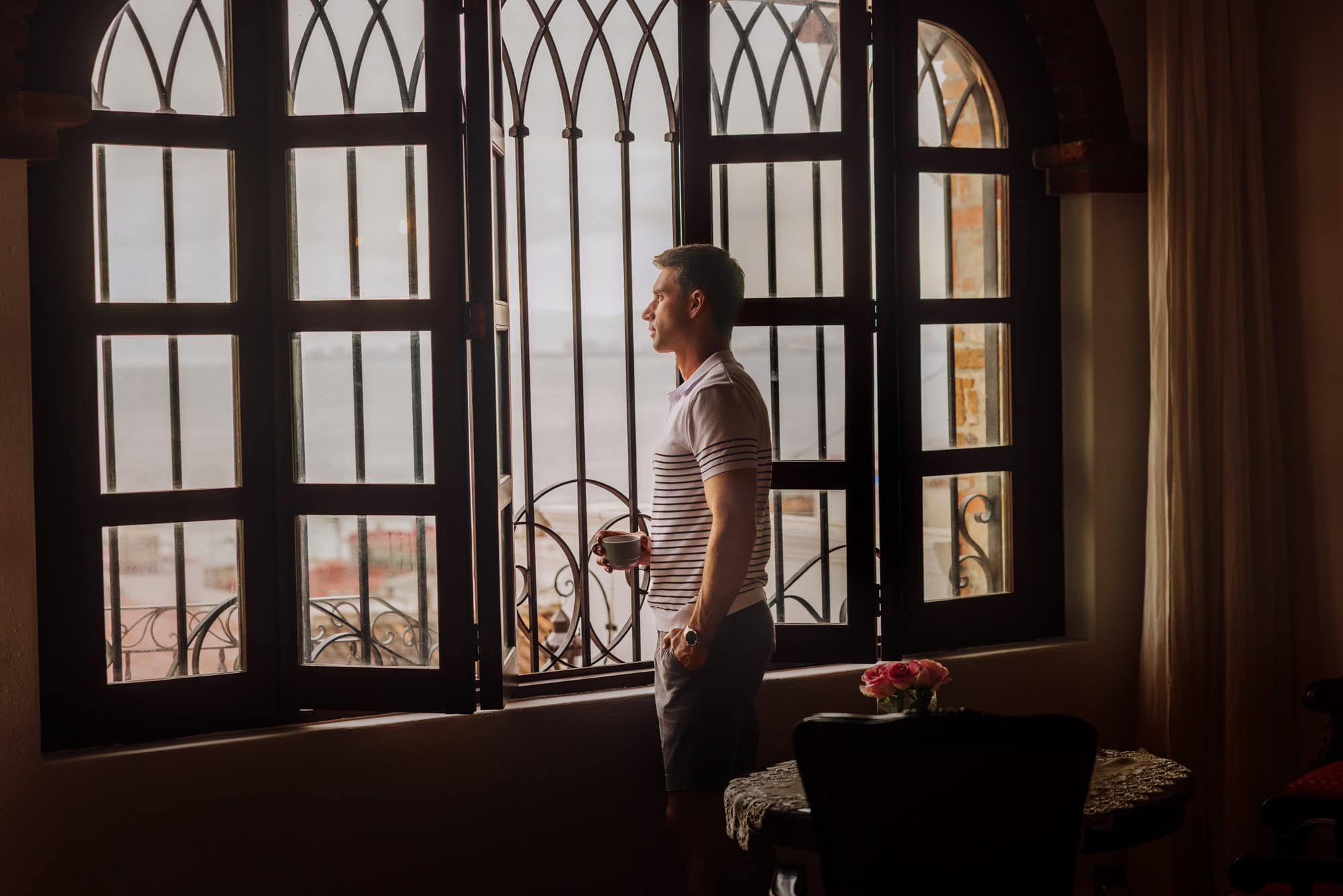 Jared Dillingham looking a the view of Puerto Vallarta from the Bellview Hotel Boutique