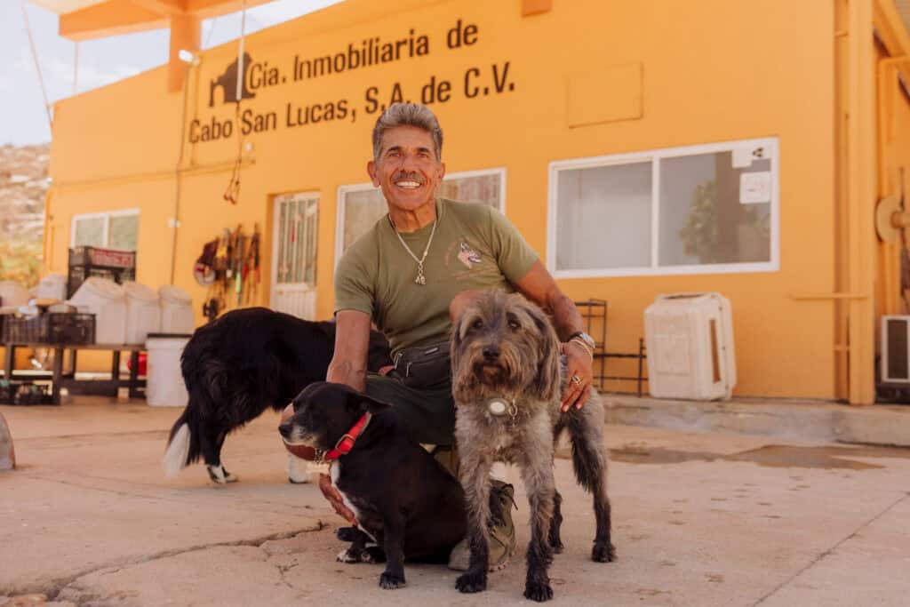 Enrique Morales and some of the shelter dogs he hikes with