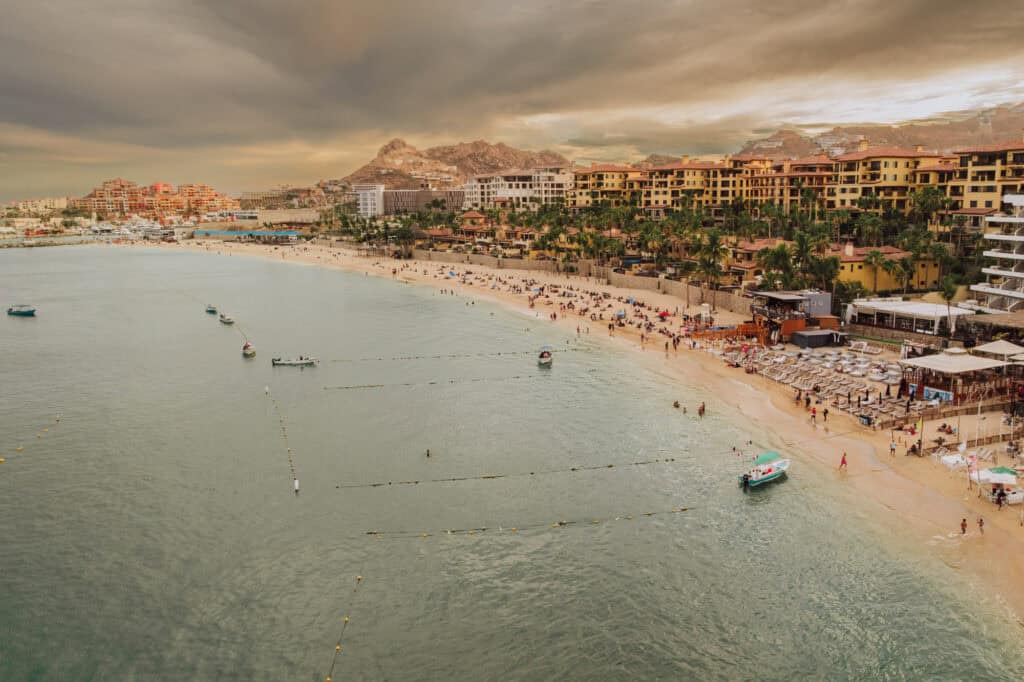 A crowded beach in Cabo San Lucas, Mexico
