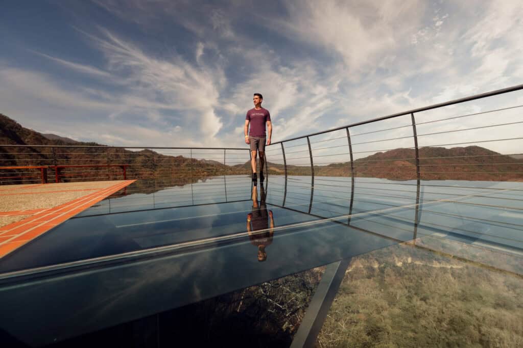 Jared Dillingham on the glass platform at Canopy River