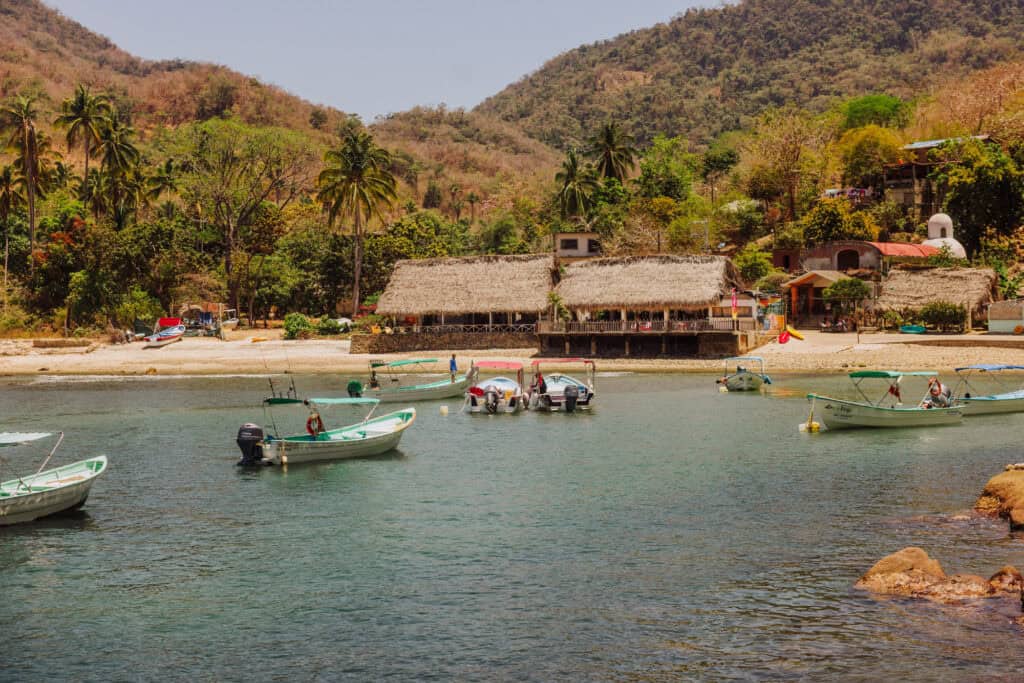 Boats arriving in Quimixto, on a day trip from Puerto Vallarta