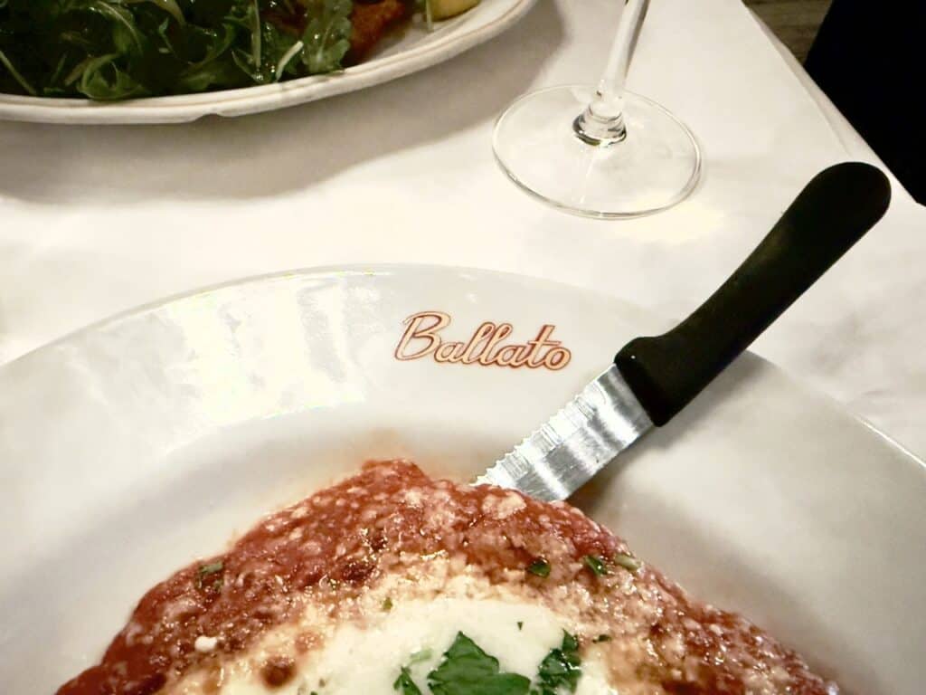 The chicken pargmigiana is one of the famous Italian dishes at Emilio's Ballato in New York City