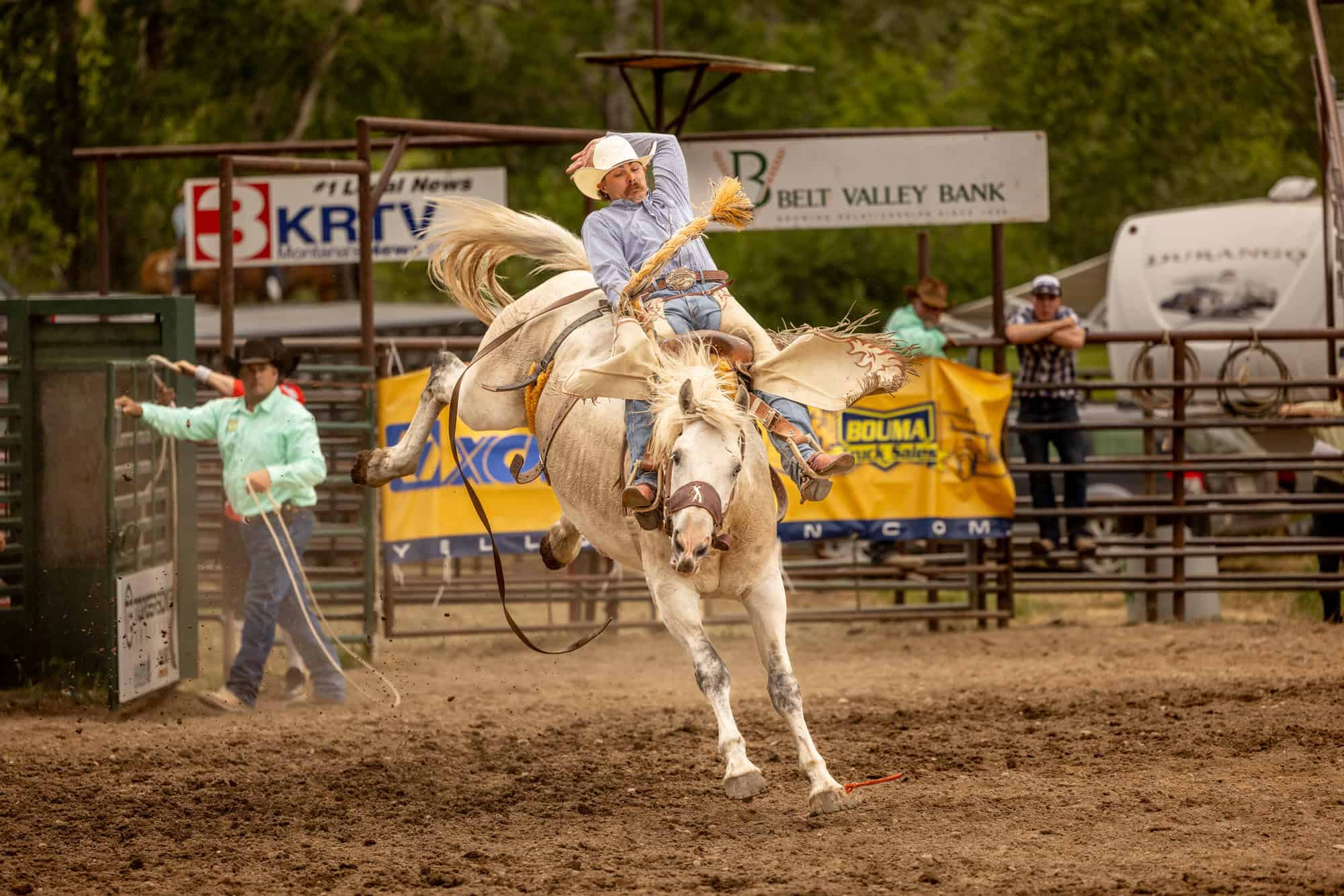 a cowboy riding a horse at the prca rodeo in motana